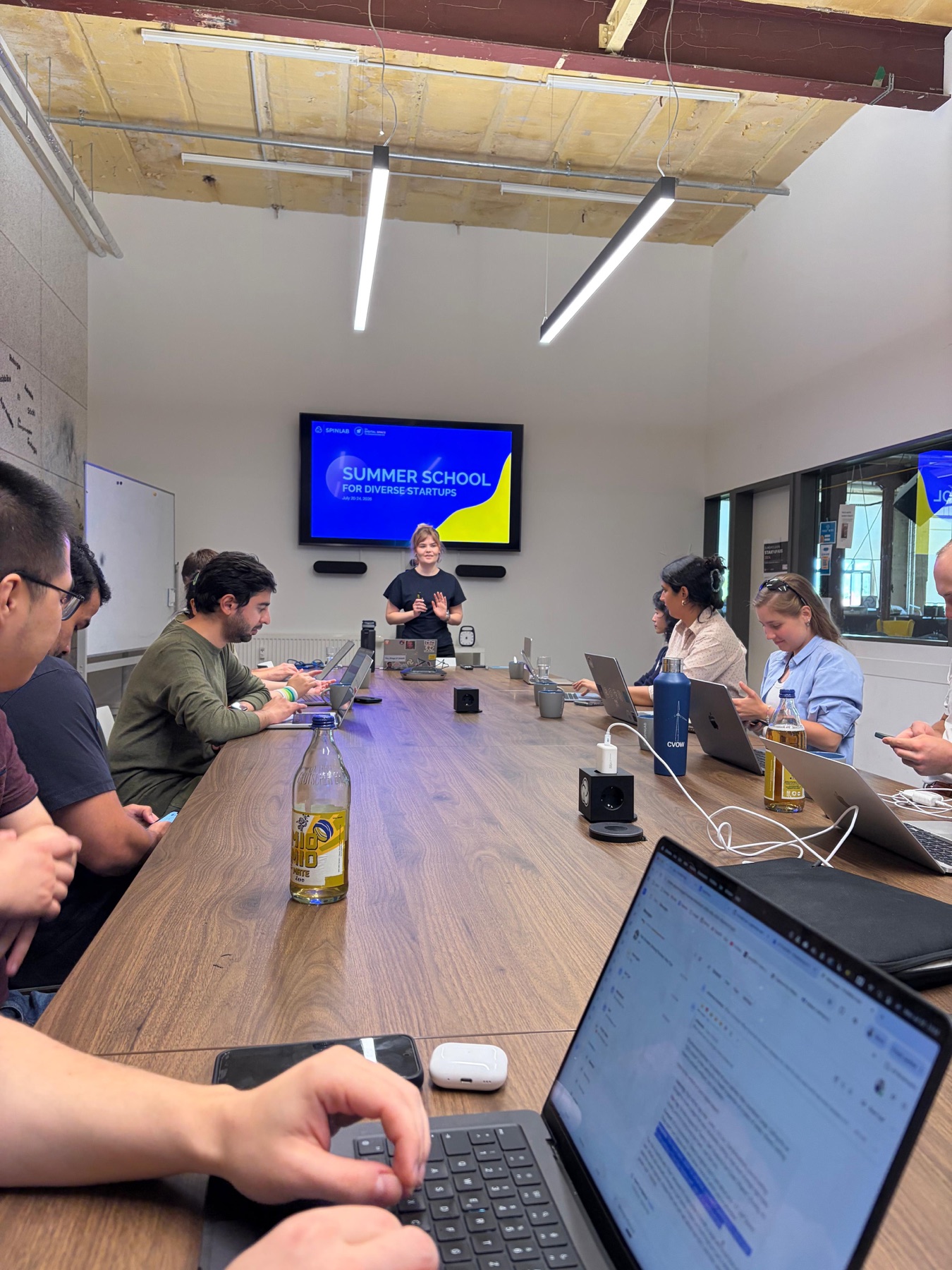 Founders working together during a Summer School workshop